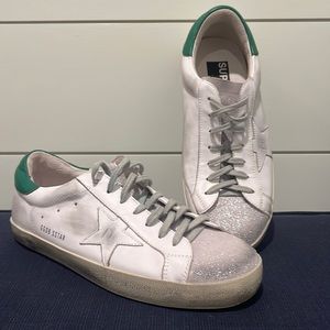 Men’s Golden Goose US Size 10. Green back top. Subtle silver toes. Never worn
